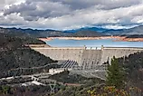Shasta Dam is a concrete arch-gravity dam across the Sacramento River in Northern California