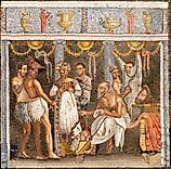Mosaic depicting a theatrical troupe preparing for a performance
