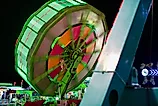Carnival rides spin at the Teton County fair in Jackson Wyoming.