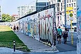 A remnant of the Berlin Wall in Berlin, Germany. Image credit: Aleksandr Dyskin / Shutterstock.com.
