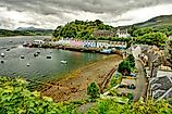 The serene settings of Portree, Scotland. Image credit: RobNaw / Shutterstock.com.