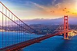 Panoramic view of Golden Gate Bridge at sunset in San Francisco, California