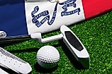 Golf ball, club and flag of Iowa for a golf championship in Iowa. Via Shutterstock / Bermix Studio.
