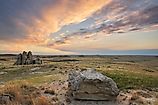 Sunset over sandstone rock formations and prairie of Medicine Rocks State Park.