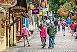 The vibrant downtown area of Helen, Georgia, bustling with tourists. Image credit: Kristi Blokhin / Shutterstock.com 