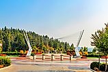 A big iron sculpture along the Couer d'Alene Lake and forest in Idaho