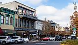 People walking to the shops with vehicles parked on the streets. Ashland, Oregon. Editorial credit: Nature's Charm / Shutterstock.com