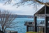 House on the lake in Northwest Arkansas, beautiful landscape view in Bella Vista. Image credit shuttersv via Shutterstock.