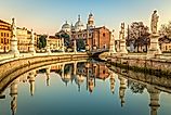 Padua, Italy at Prato della Valle at dusk. (Credit: Sean Pavone via Shutterstock)
