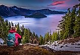 Backpacker overlooking Crater Lake and Wizard Island.