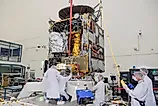 Scientists working on Psyche's thruster integration. By NASA - https://photojournal.jpl.nasa.gov/mission/Psyche, Public Domain
