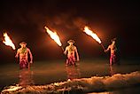 Three Maui Men Juggling Fire in Hawaii