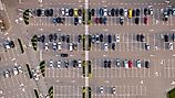 An aerial view of a large parking lot. 