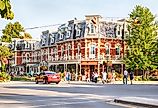 Prince of Wales Hotel with horse carriage in Niagara On The Lake, Ontario, Canada. Image credit AnjelikaGr via Shutterstock