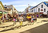 Vacationers on Market Street in Mackinac Island. Image credit Alexey Stiop via Shutterstock.com
