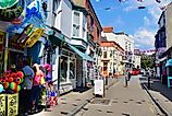 Tenby, Pembrokeshire, Wales: The view of St George's Street taken from just inside the Arches gateway.
