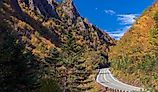 A highway winds through the Dixville Notch mountain pass in New Hampshire.