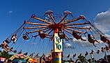 Visitors take a ride on the YoYo at the Iowa State Fair in Des Moines. Editorial credit: Ganeshkumar Durai / Shutterstock.com