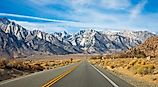 Empty Road leading to Mount Whitney near Lone Pine, California