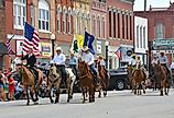 Main Street in Council Grove, Kansas, during the Washunga Days Parade. Image credit Mark Reinstein via Shutterstock.