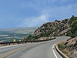 A scenic view descending the twisting road from Mt. Scott, Wichita Mountains Wildlife Refuge, Oklahoma