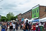 Downtown public street fair in Yellow Springs, Ohio. Image credit Adam Lovelace via Shutterstock