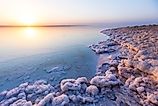 Salt on the shore of the Dead Sea. Jordan sunset landscape