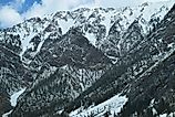 Cold barren snowy mountain peaks in Colorado Rocky Mountains.
