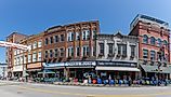 Buckhannon, West Virginia: The Historic Building along Main Street, with locals and tourist walking along, waiting for the parade