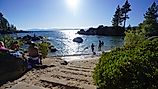 People enjoying the end of summer at the beach. Photo taken at Sand Harbor State Park in Lake Tahoe over the Labor Day weekend. 