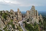 The Needles Highway in South Dakota, with winding road passing through towering, needle-like rock formations.