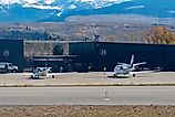 Planes landing at the Jackson Hole Airport in Wyoming's Grand Teton National Park. Editorial credit: John McAdorey / Shutterstock.com