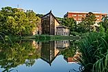 Ithaca College Muller Chapel and Chapel Pond, Ithaca, New York. By SEALANDSKYPHOTO / Shutterstock.com