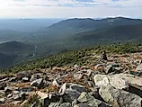 View from he top of Mt. Sugarloaf with a view of Mt. Spaulding and Mt. Abraham in Maine 