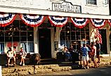 Neighbors catching up outside The Brewster Store on Cape Cod, Massachusetts. Editorial credit: James Kirkikis / Shutterstock.com