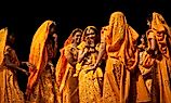 Indian folk dancers in the traditional lehenga-choli costume.