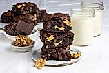 Sliced brownies with chopped walnuts