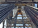 Top drive system (TDS) is a motorized unit suspended from the derrick to rotate the drill string, revolutionizing drilling by enabling faster, safer operations by replacing the traditional rotary table and Kelly system.