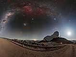 The Moon and Milky Way rise over the Vera C. Rubin Observatory in Chile, where Rubin will repeatedly scan the southern sky. Image Credit: RubinObs/NOIRLab/SLAC/NSF/DOE/AURA/P. Horálek, CC BY 4.0.
