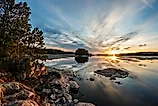 Sunset in Voyageurs National Park, showcasing some of the oldest rocks on earth. 
