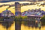 Albany, New York, skyline on the Hudson River at sunset.