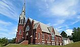 St. Thomas Catholic Church in Underhill Center, Vermont. By Niranjan Arminius, CC BY-SA 4.0, Wikimedia Commons