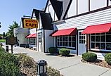 Exterior of the Sanders Cafe and Museum, the birthplace of Kentucky Fried Chicken, in North Corbin, Kentucky. Image credit Gerry Matthews via Shutterstock.com