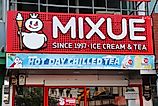 Mixue ice cream and tea cafe signage. Editorial credit: Opasbbb / Shutterstock.com