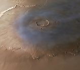 Olympus Mons volcano on Mars' surface. Editorial credit: Andera Luck, CC BY 2.0, via Wikimedia Commons