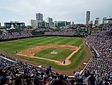 Chicago Cubs fans watching a Chicago Cubs baseball game at Wrigley Field. 