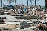 Kids play at their Demaged house. Indian Ocean Earthquake and Tsunami disaster Destroyed Aceh in December 26 2004