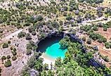 Beautiful Aerial view of Hamilton Pool swimming hole in Dripping Springs near Austin, Texas.