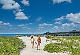 Girls walking on Folly Beach. South Carolina.
