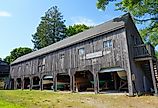  Exterior view of the Maine Maritime Museum with exhibits about the maritime heritage and culture of Maine in Bath. Image credit EQRoy via Shutterstock.